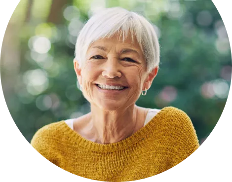 Woman smiling after receiving Neurofeedback treatment